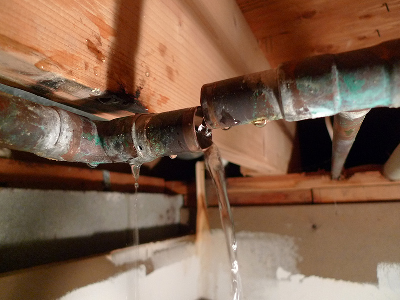 hidden water leak in rusty pipe