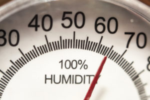 Closeup of a baromater measuring high humidity levels