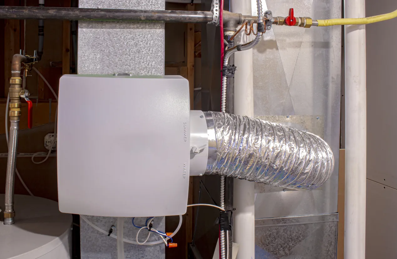 A home humidifier attached to the return duct