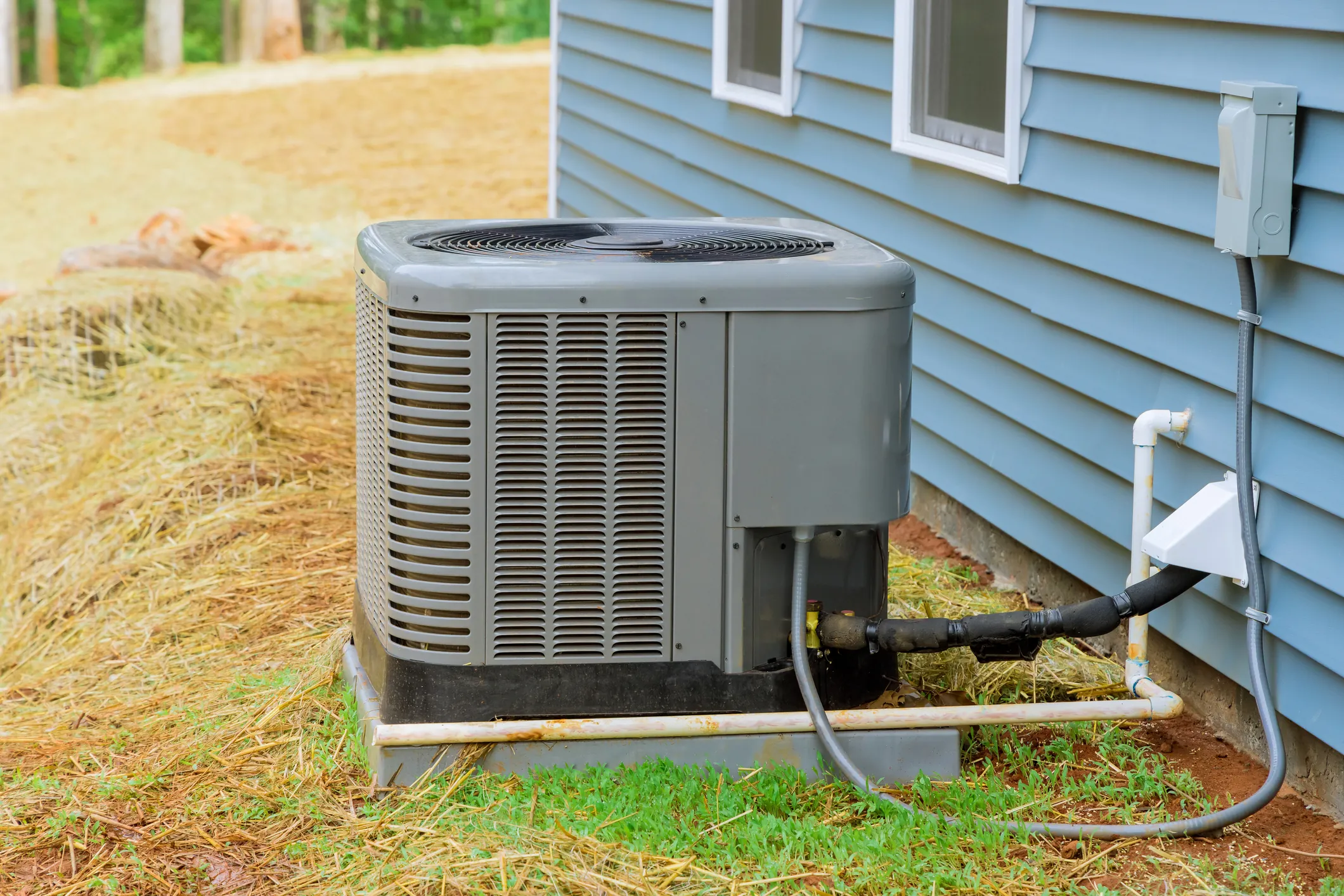 Installation of electric air conditioner residential outside near a new house