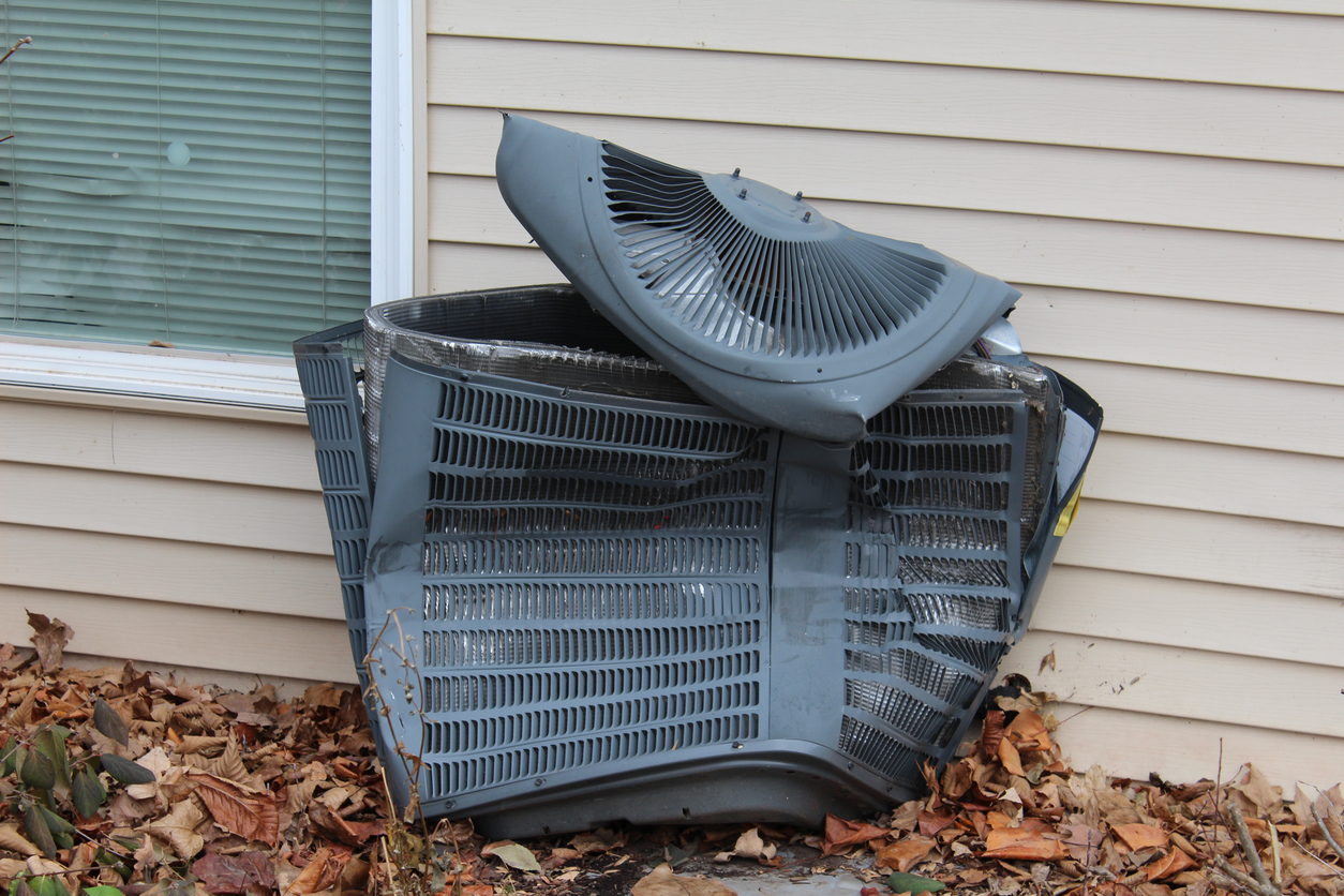 Central AC unit damaged by hurricane 
